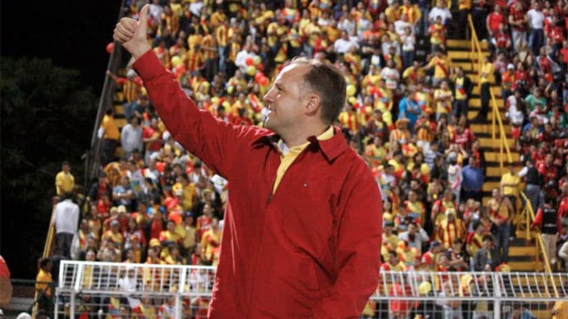 Herediano owner David Patey salutes the fans