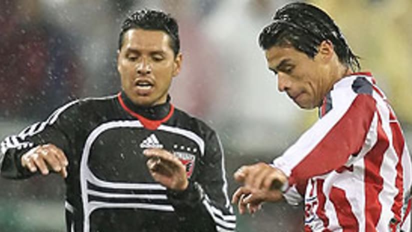 Christian Gomez (L) and United must top Chivas if they are to advance.