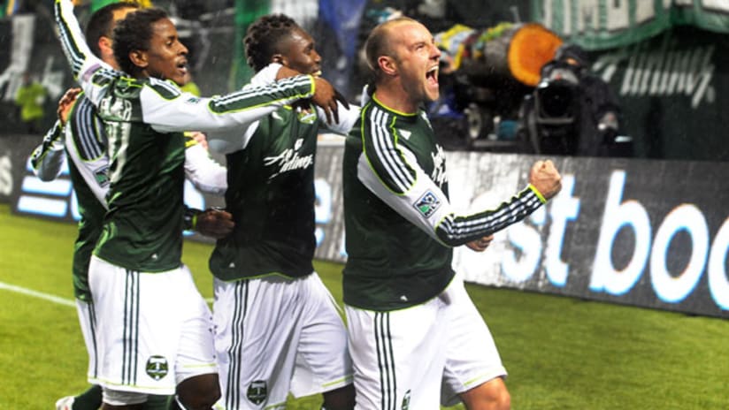Portland's Kris Boyd and teammates celebrate his debut goal, March 12, 2012.