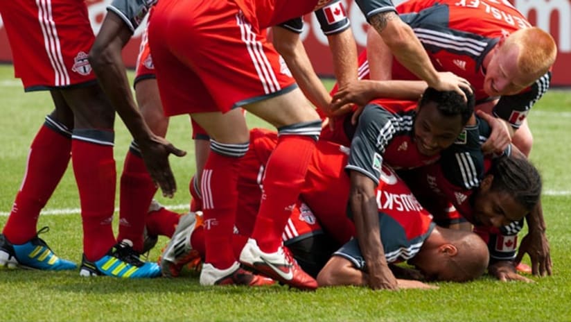 Mikael Yourassowsky knelt to the ground after putting TFC ahead 2-1.