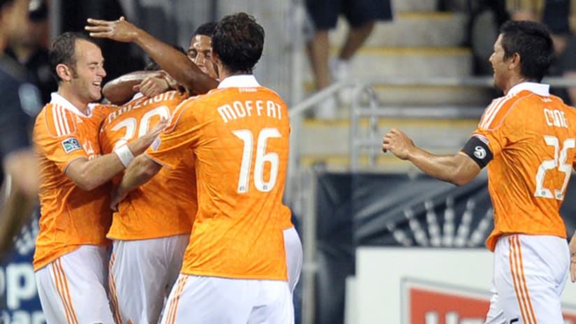 Members of the Houston Dynamo celebrate Geoff Cameron's goal on Saturday night against Philadelphia.