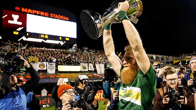 MLS Cup gallery Portland Timbers Nat Borchers lift trophy