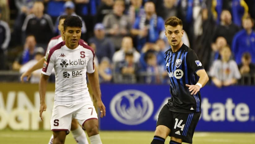 Montreal Impact midfielder Amar Sejdic looks to make a play vs. Saprissa in CCL