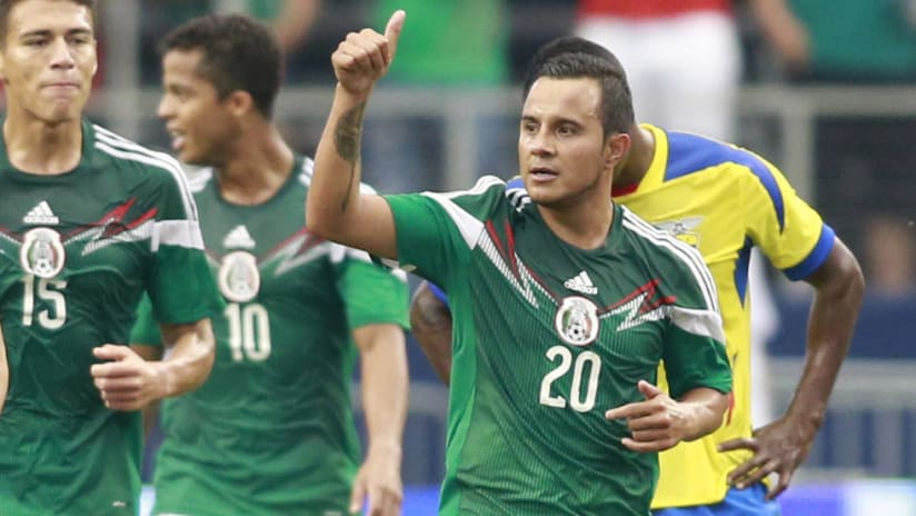 Luis Montes - celebrates a goal for Mexico in 2014