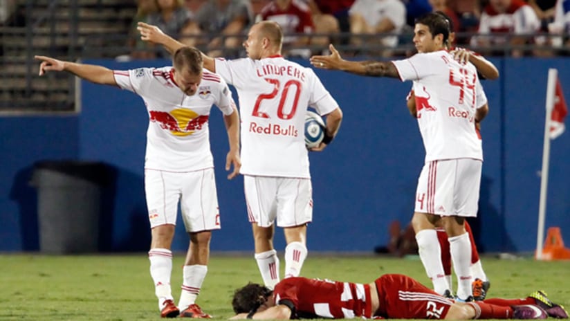 FC Dallas' Zach Loyd lies on the field after he was fouled against the Red Bulls on Saturday night.