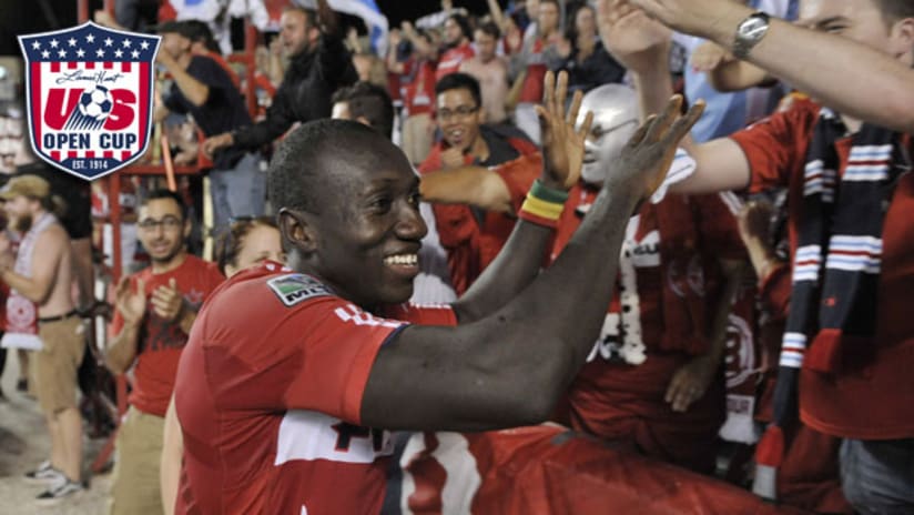 USOC: Dominic Oduro celebrates with the fans.