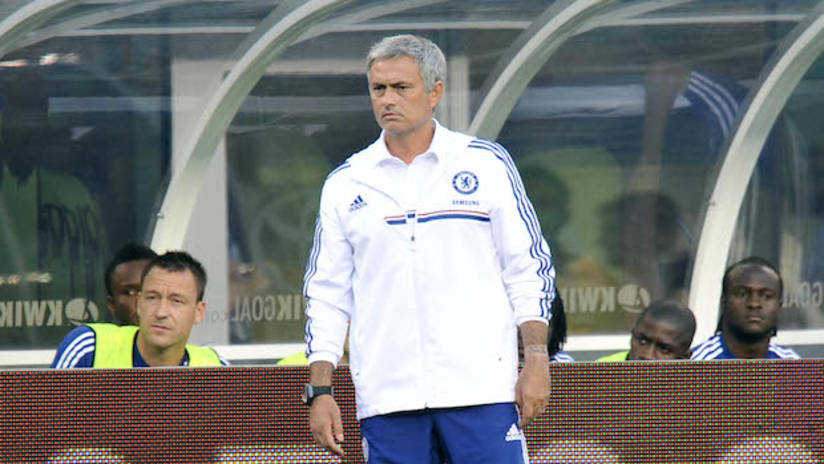 Chelsea manager Jose Mourinho stands on the sidelines