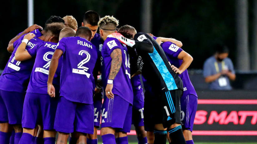 Orlando City SC huddle before MLS is Back Tournament opener