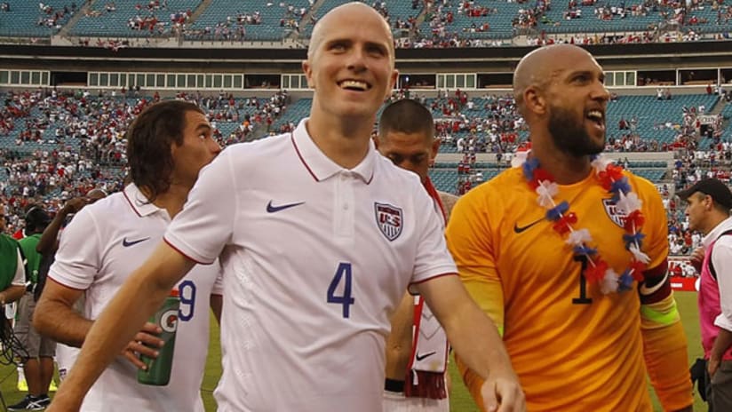 Michael Bradley and Tim Howard coming off the field vs. Nigeria
