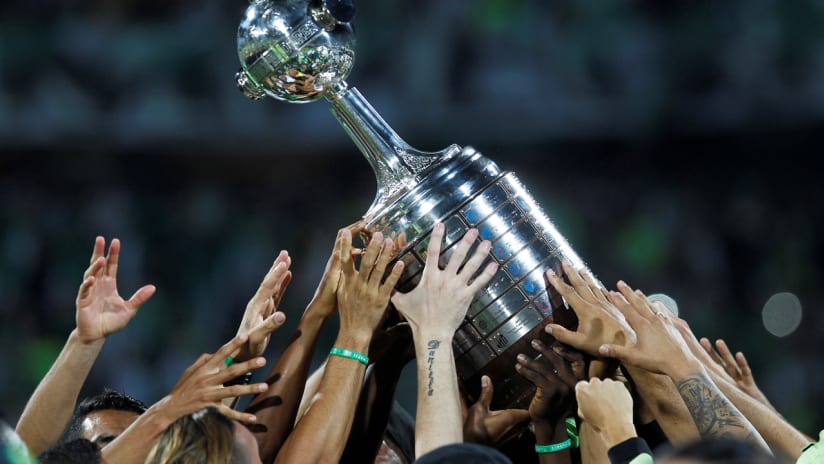 Copa Libertadores trophy - being raised by Atletico Nacional players in 2016