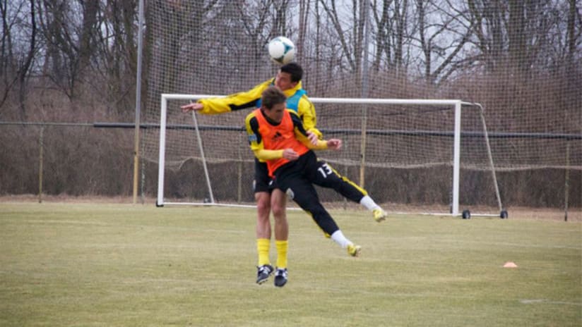 Two members of the Columbus Crew play at the Obetz training facility