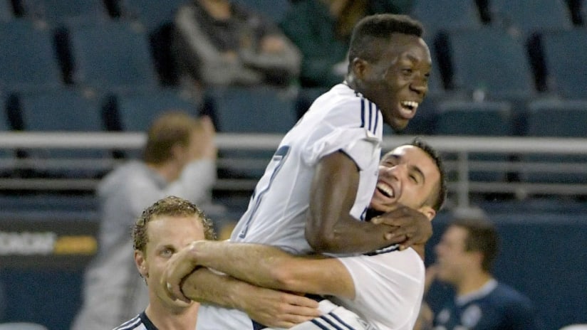 Alphonso Davies, Andrew Jacobson - Vancouver Whitecaps - celebrate the former's winner in CONCACAF Champions League play