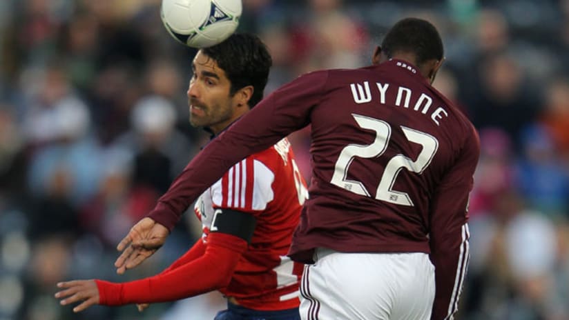 Juan Pablo Angel heads the ball past Marvell Wynne