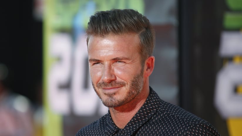 David Beckham smiles