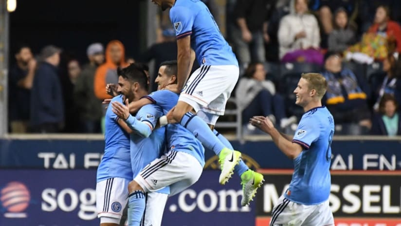 David Villa - New York City FC - gets smothered by teammates after golazo