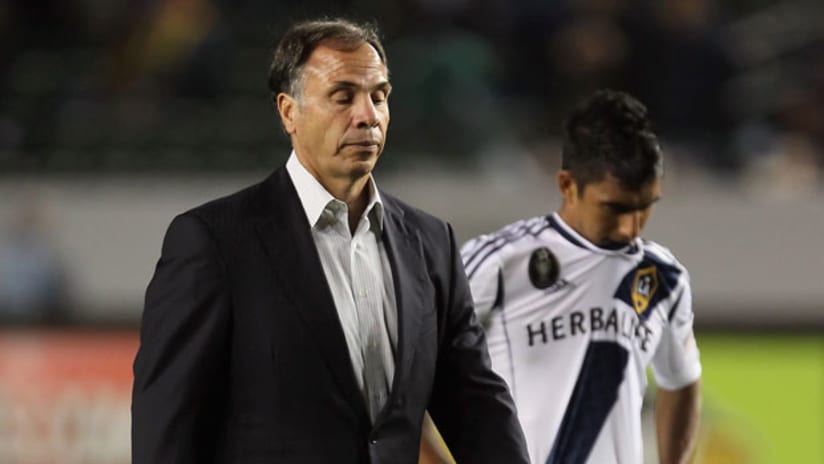Bruce Arena and A.J. DeLaGarza are dejected after the Galaxy were ousted from the CCL.