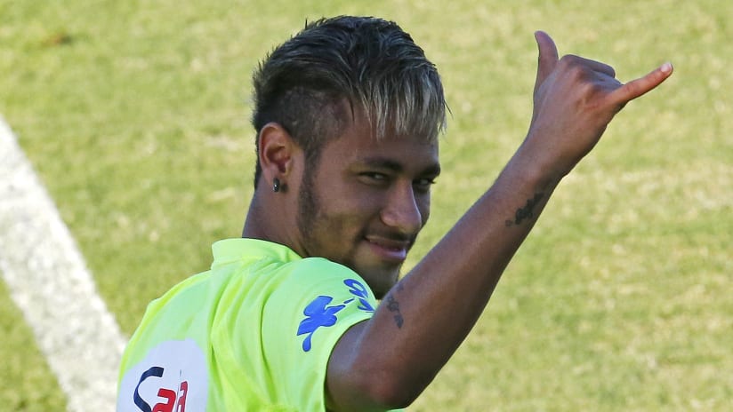 Neymar greets in Brazil training