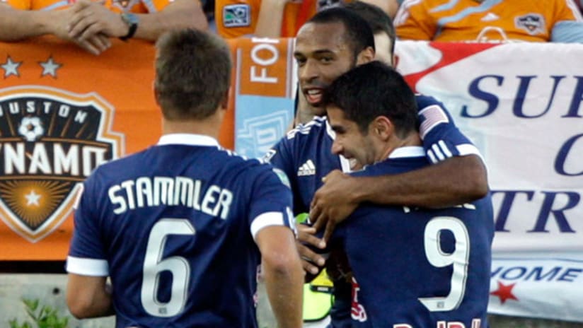 New York's Thierry Henry (center) celebrates with Juan Pablo Ángel after an early goal on Saturday night against the Houston Dynamo.