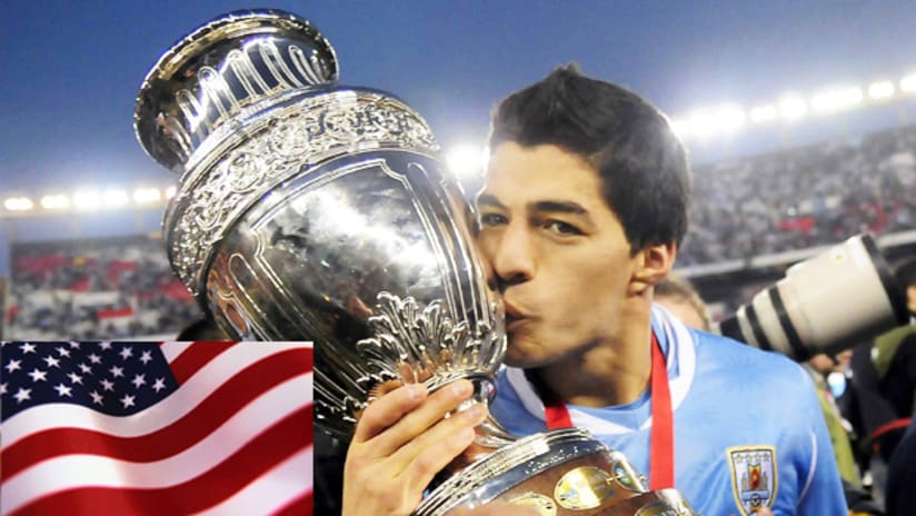 Luis Suarez kisses the Copa America trophy