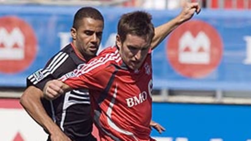 Jim Brennan (right) was Toronto FC's first player, and is likely its most crucial as well.