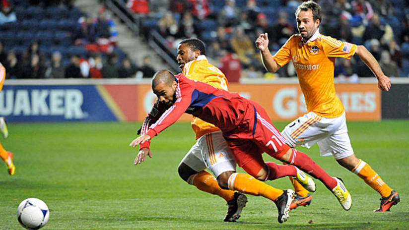 Chicago's Alex takes a spill against the Houston Dynamo