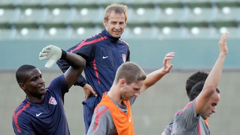 Jurgen Klinsmann watches Bill Hamid, Clarence Goodson and Landon Donovan at US training