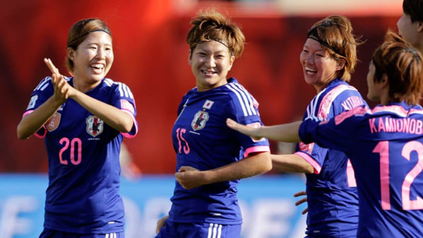 Japan celebrate advancing to the 2015 Women's World Cup final