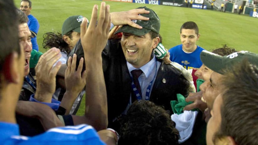 Jose Manuel de la Torre celebrates with Mexico.