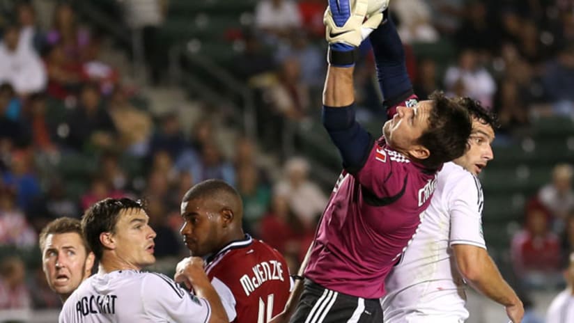 Joe Cannon goes up for a save against Chivas USA.
