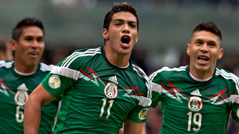 Mexico players celebrate beating New Zealand