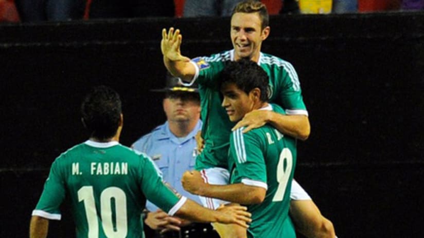 Miguel Layun and Raul Jimenez of Mexico (July 20, 2013)