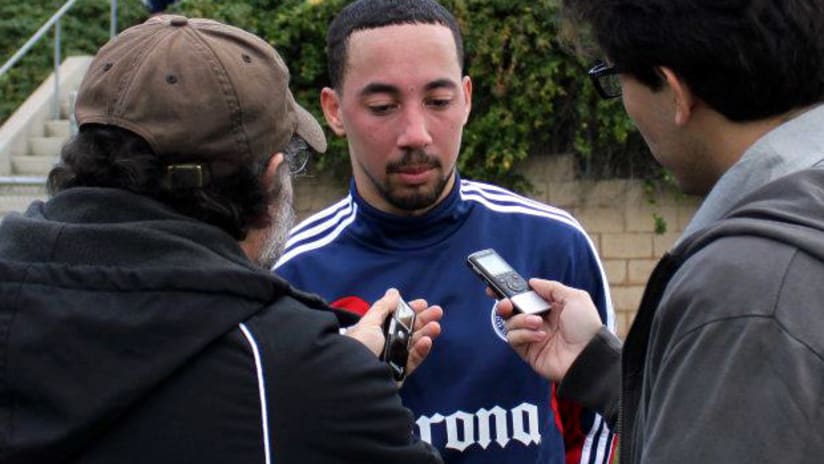 Chivas USA midfielder Ryan Smith talks to reporters