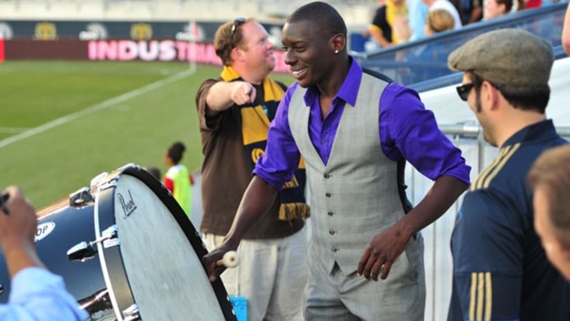 Bakary Soumare bangs the drum at a Union game