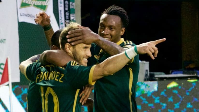Portland Timbers congratulate Gaston Fernandez after scoring a goal