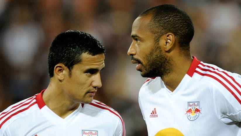 Thierry Henry and Tim Cahill