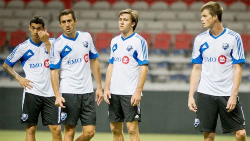 Montreal's Miguel Montano, Davy Arnaud, Andrew Wenger and Justin Braun train.