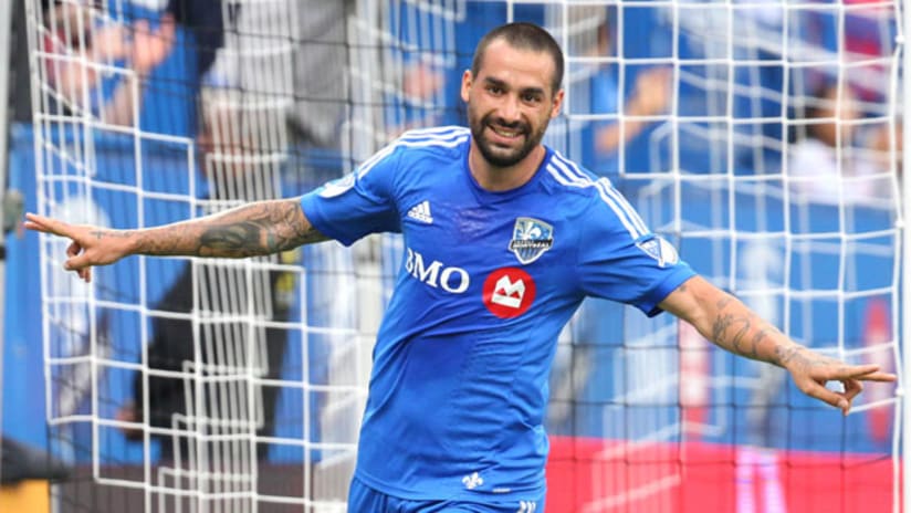Montreal Impact midfielder Andres Romero smiles after scoring a goal