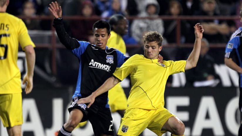 San Jose's Anthony Ampaipitakwong (left) and Columbus' Robbie Rogers vie for the ball.