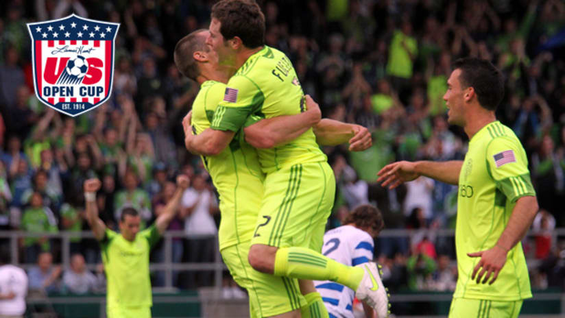 Mike Fucito celebrates with his Seattle teammates after scoring against Kitsap in USOC play.