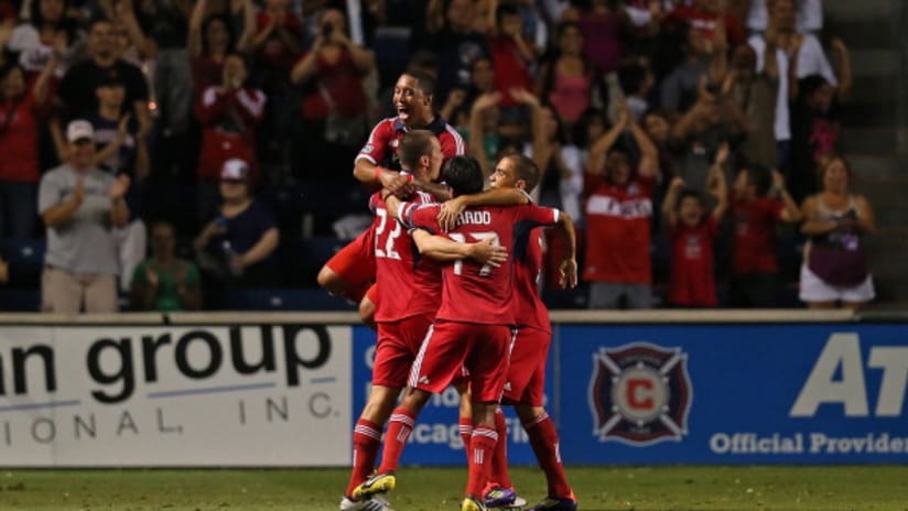 Austin Berry and Chicago Fire teammates celebrate Berry's game-winning goal vs. Toronto