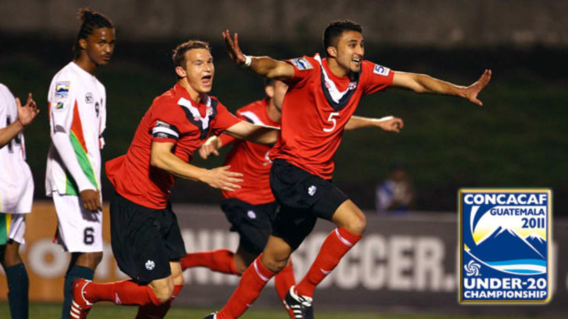 Derrick Bassi (5) celebrates his winning goal for Canada over Guadeloupe.