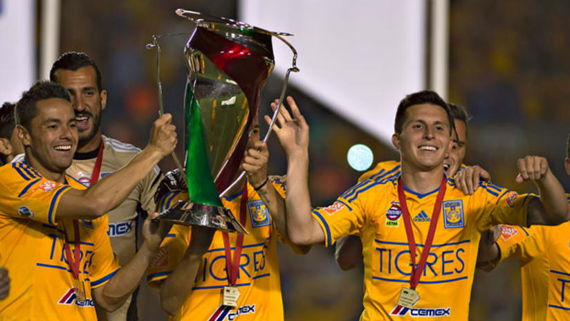 Jose Torres with Copa MX trophy