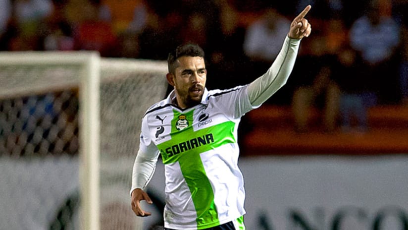 Herculez Gomez points after doing something good for Santos