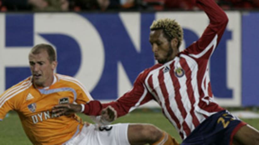 Lawson Vaughn (right) and other Chivas defenders could use more scoring help.