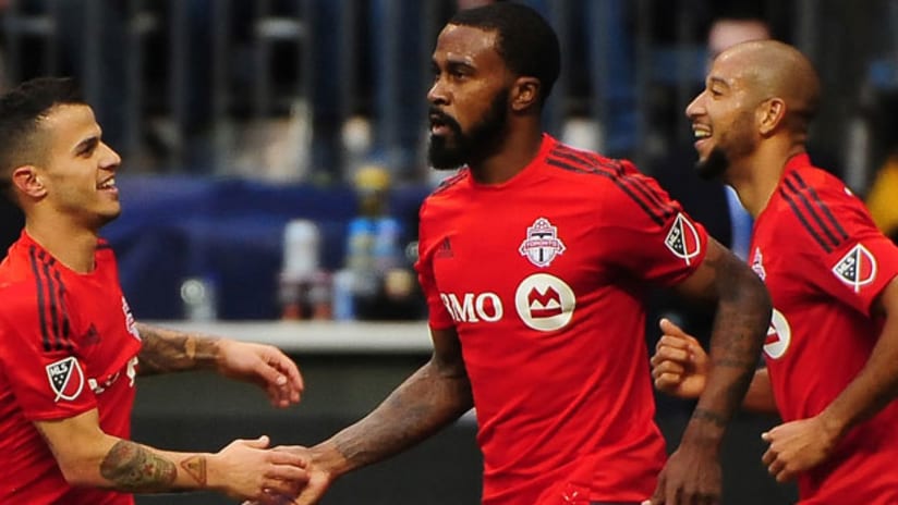 Toronto FC's Robbie Findley celebrates with Giovinco and Morrow