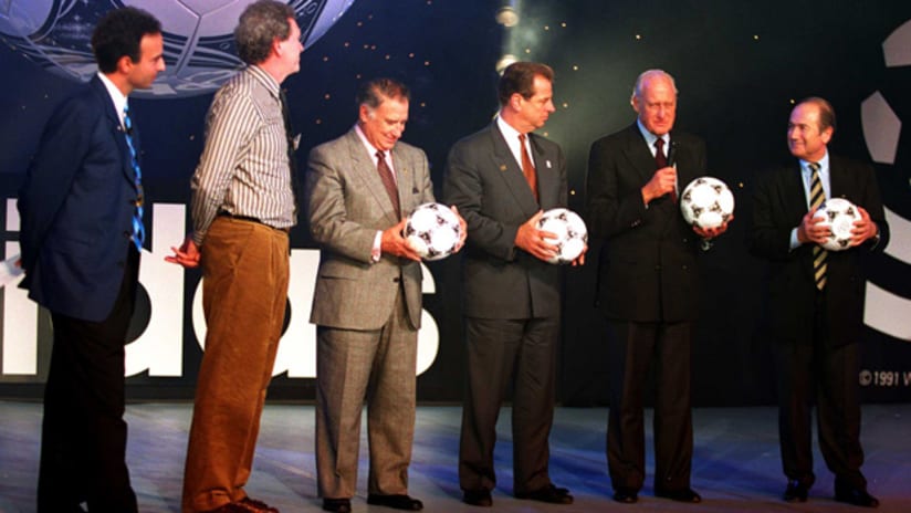 Alan I. Rothenberg (third from left) shares the stage with FIFA's Joao Havelange and Sepp Blatter at the MLS unveiling