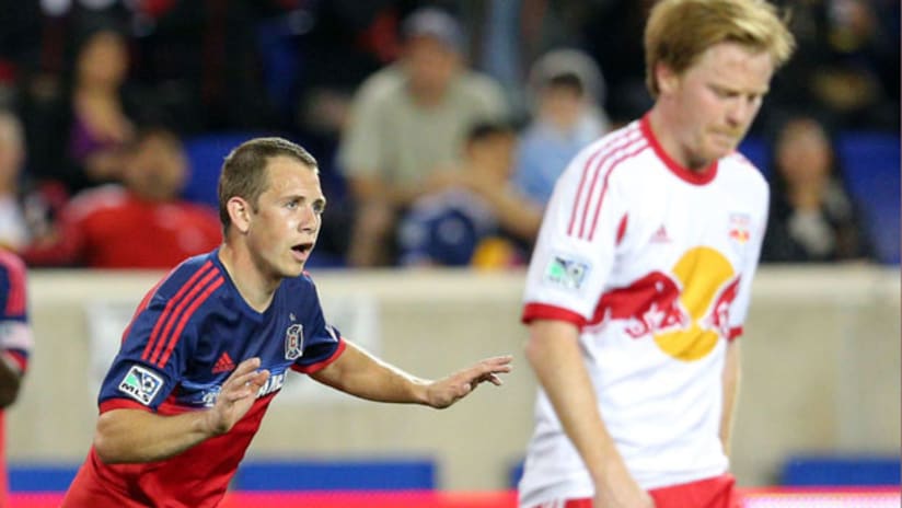 Harry Shipp celebrates a hat trick against Dax McCarty (May 10, 2014)
