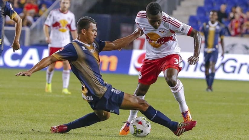 Ambroise Oyongo (New York Red Bulls) in action against FAS in the CCL
