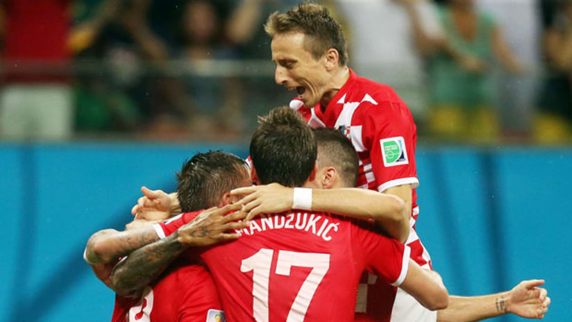 Croatia's Ivica Olic celebrates scoring against Cameroon