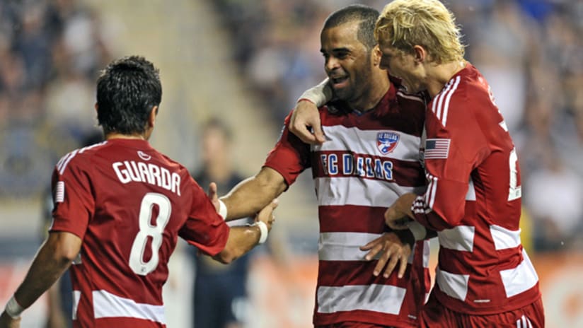Maicon Santos celebrates with Brek Shea and Bruno Guarda after his goal against Philly